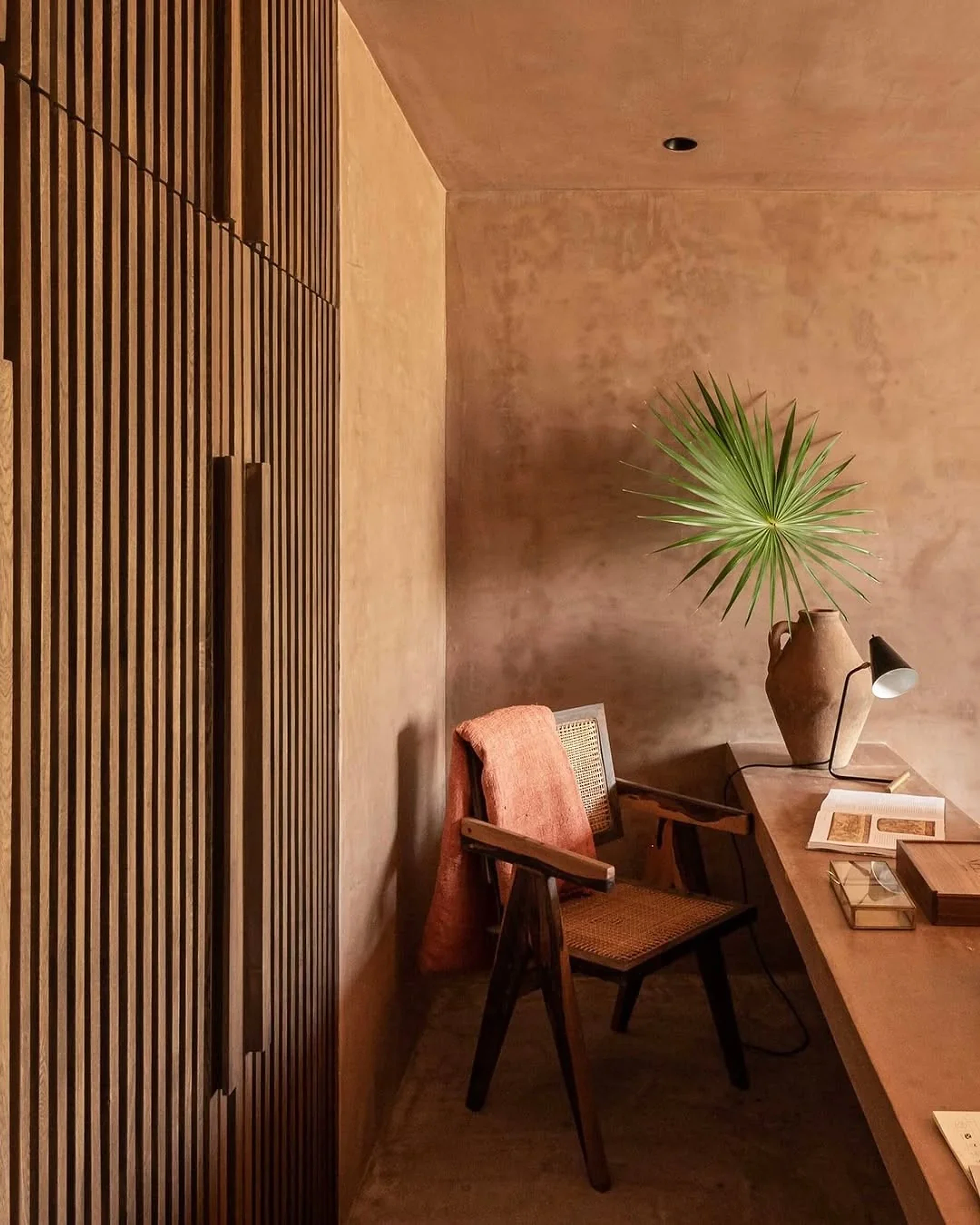 Warm natural materials inside a considered Goa home